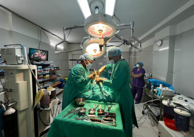 Surgical team performing a rhinoplasty in a well-equipped operating room.